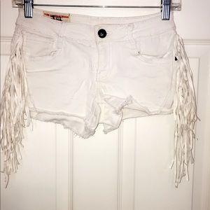 White denim fringe shorts